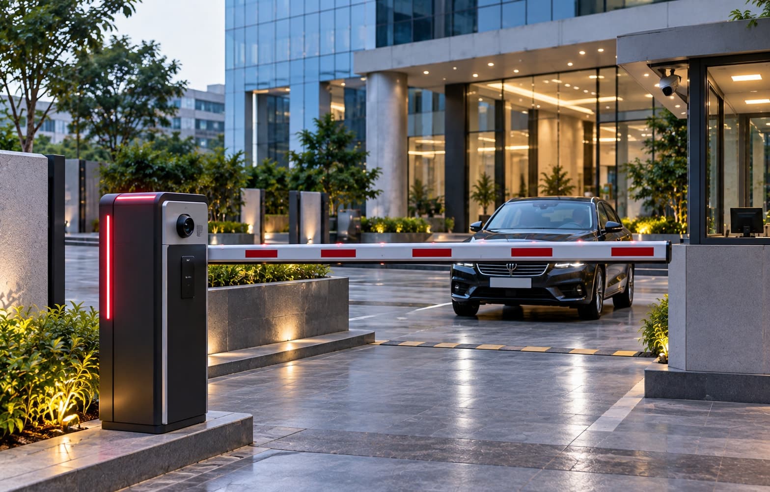 A car passing under a raised automated boom barrier at an office entrance
